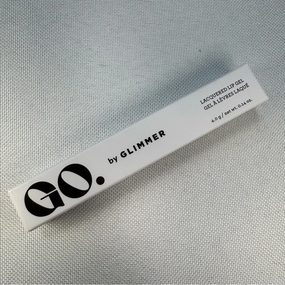 NWT AVON GO. by Glimmer Lacquered Lip Gel - Orchid Bloom